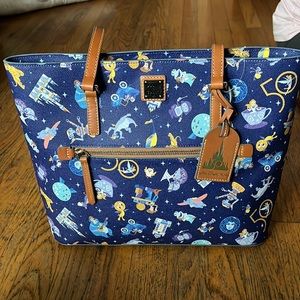 Disney dooney and Bourke Walt Disney world 50th park icons tote bag